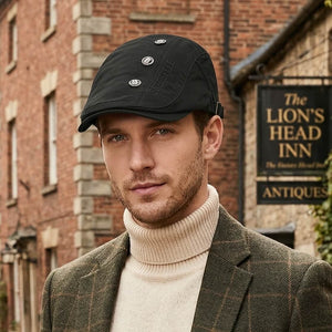 Male model wearing a black British old-money ivy cap with a cream turtleneck sweater and green plaid blazer.
