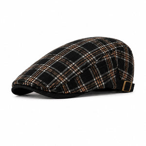 Black men's plaid flat cap with adjustable back strap, classic ivy silhouette, and clean white background.