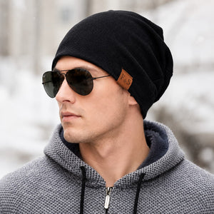 Black fleece-lined slouchy beanie worn for cold-weather daily style