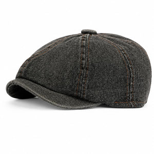 Black washed denim newsboy cap on white background