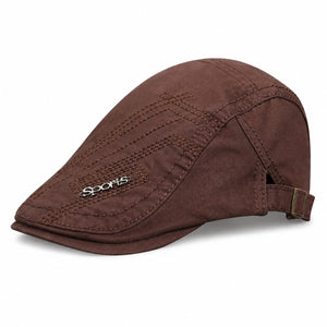 Brown cotton ivy flat cap with adjustable side buckle on white background