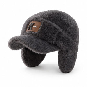 Gray men's winter ear flap hat with soft faux fur texture, warm trapper style, and front patch detail on a clean white background.