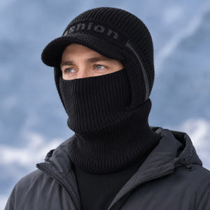 Men's black visor balaclava worn with a winter jacket