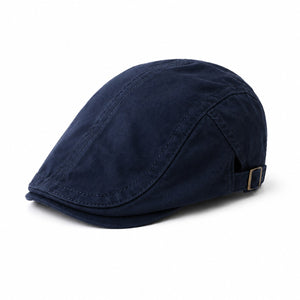 Navy men's adjustable flat cap in cotton with a timeless ivy cap shape and clean white background.
