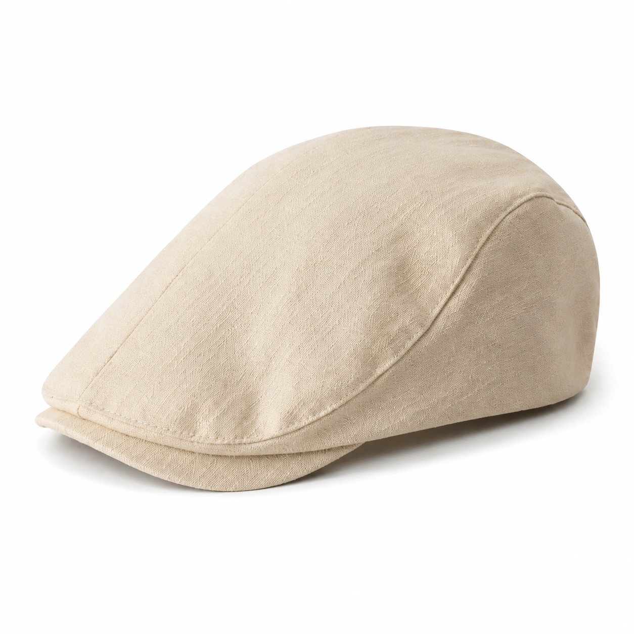 Beige men's solid color vintage flat cap with a classic ivy cap silhouette on a clean white background.