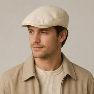 Beige vintage flat cap side view with classic curved brim