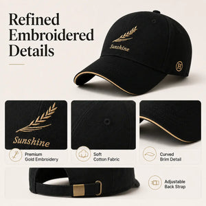 Black embroidered baseball cap with gold embroidery curved brim and adjustable back strap