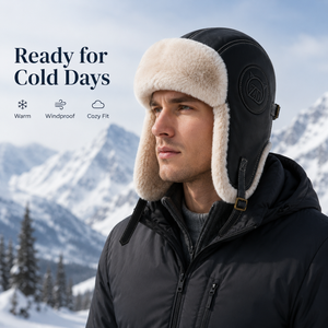 Black plush aviator hat for cold days with warm earflap coverage, faux leather shell, and secure adjustable chin strap