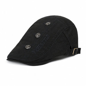 Black vintage flat cap for men with adjustable back buckle, decorative metal button details, and cotton fabric on a clean white background.