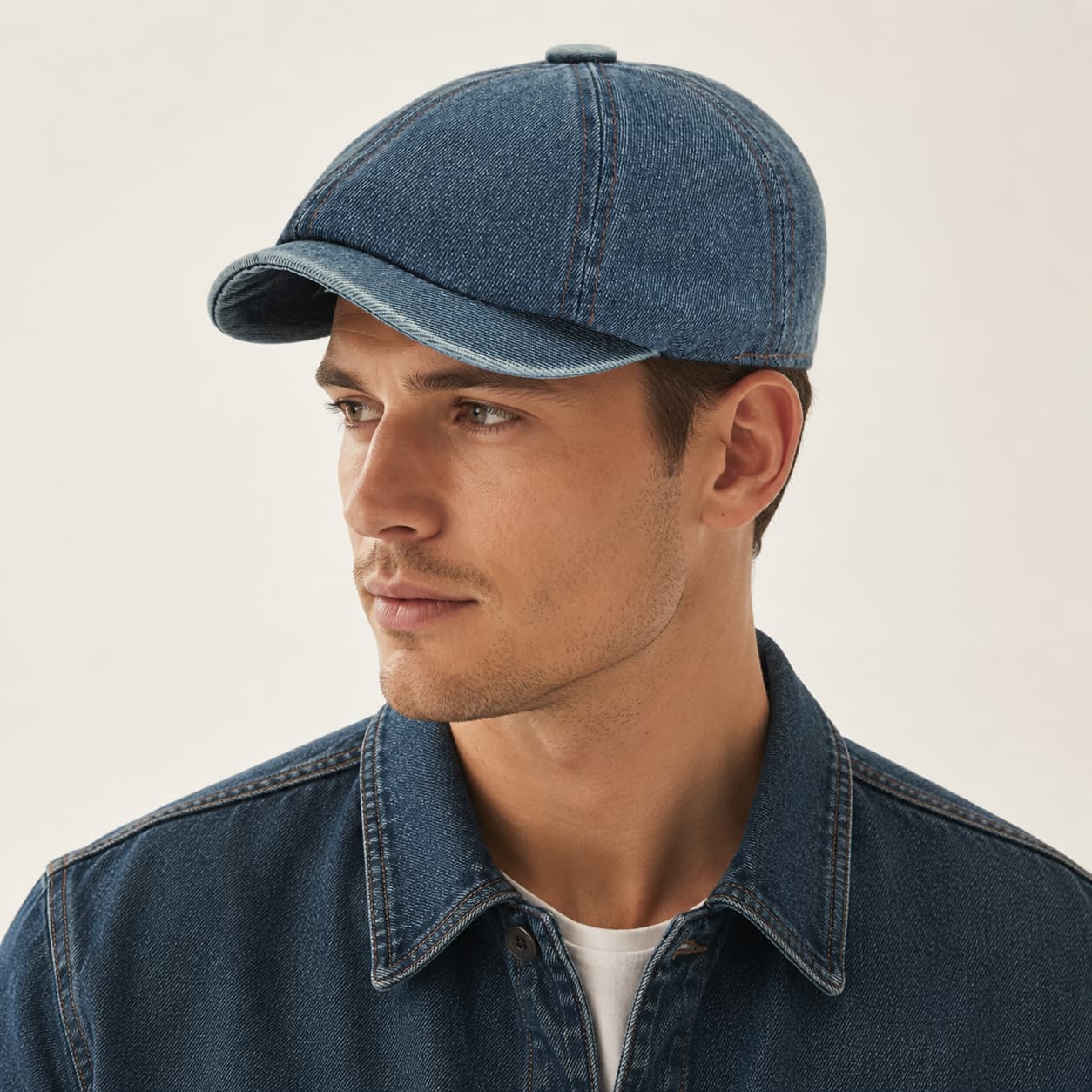 Model wearing denim blue washed denim newsboy cap