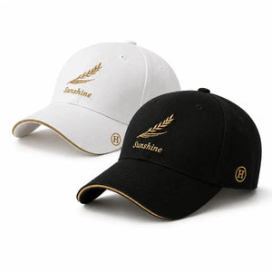 Black and white embroidered baseball caps with gold leaf design for men and women