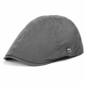 Gray men's vintage flat cap made from cotton fabric with classic stitching and a clean white background.