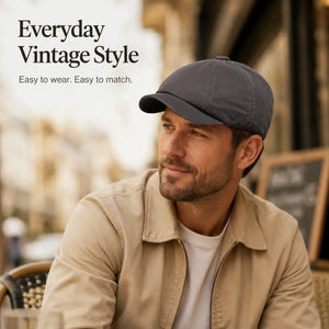 Gray vintage newsboy cap with curved brim and low profile design