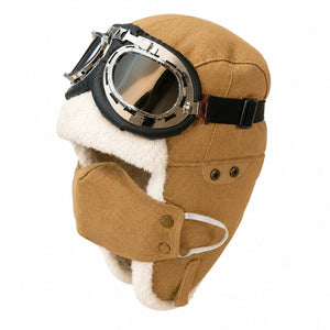 Khaki men's winter aviator hat with goggles, soft faux fur lining, ear flaps, and cold-weather outdoor design on a clean white background.