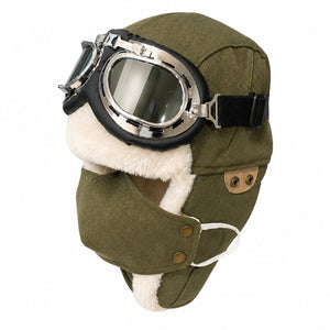 Military green men's winter aviator hat with goggles, faux fur ear flaps, and warm outdoor style on a clean white background.