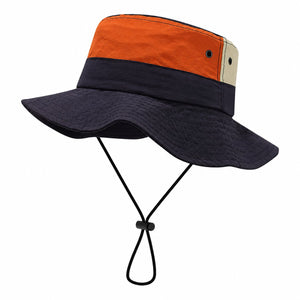 Navy men's sun protection boonie bucket hat with wide brim, chin cord, breathable eyelets, and colorblock outdoor style on a clean white background.
