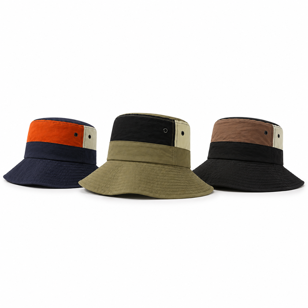 Navy outdoor sun protection bucket hat worn by man on coastal hiking trail with adjustable chin cord